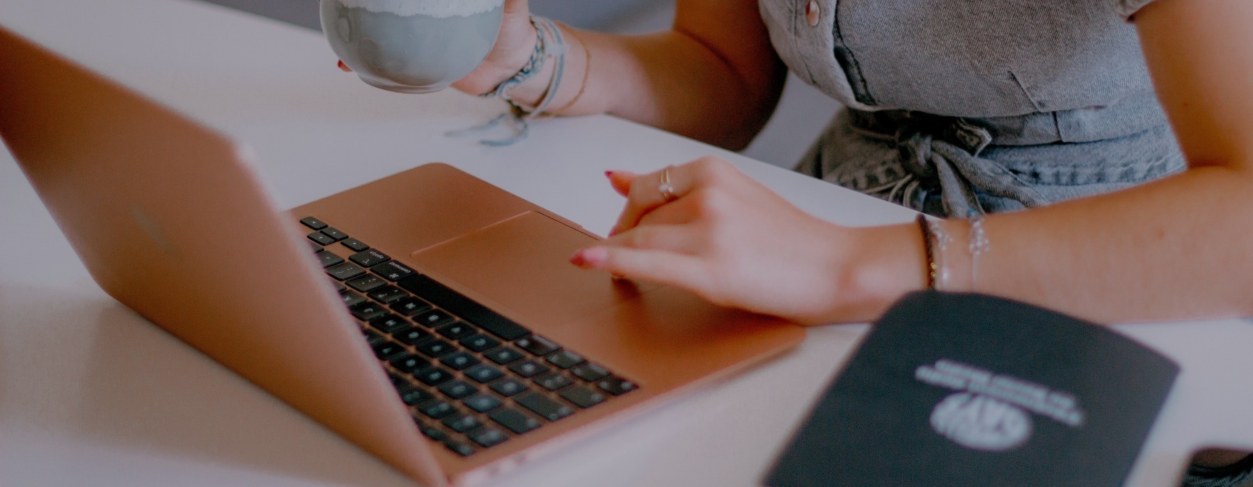 woman typing on laptop